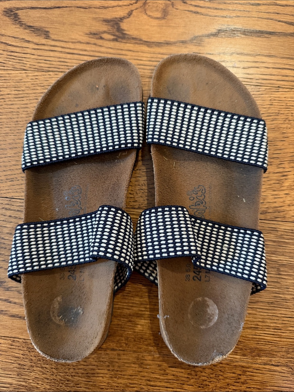 Birki’s Black and White Slip-On Sandals